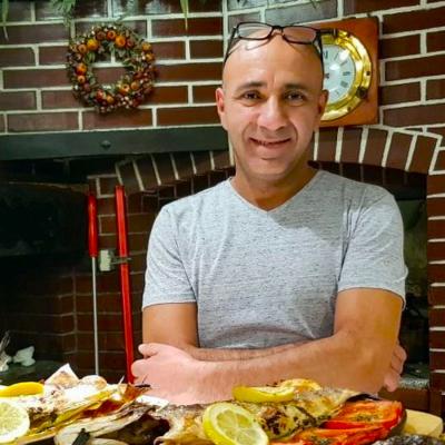 Abdoul and His Wood-Fired Oven Baked Fish
